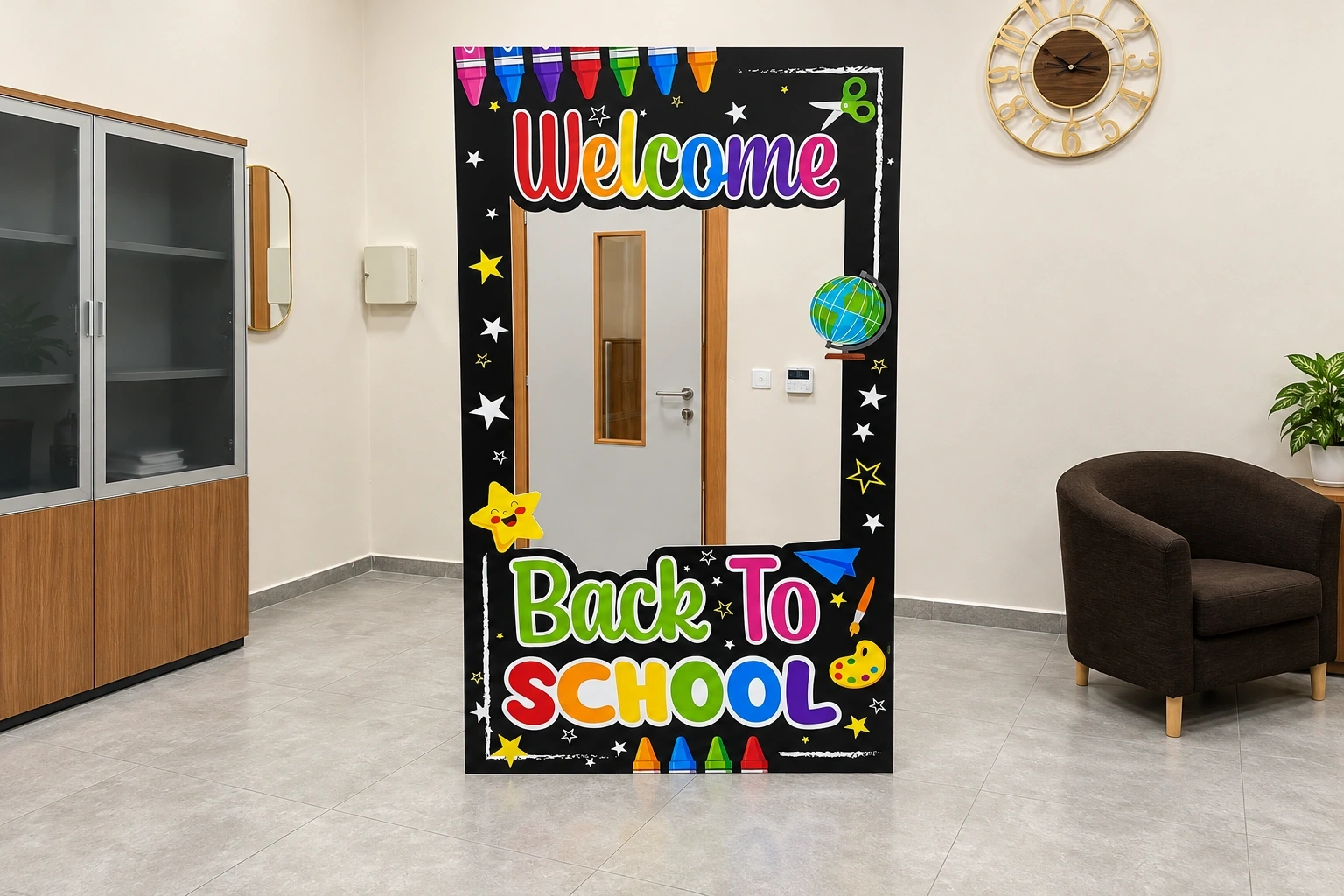 Tall free-standing cut-out photo frame printed with colourful Welcome and Back to School lettering, standing in an office