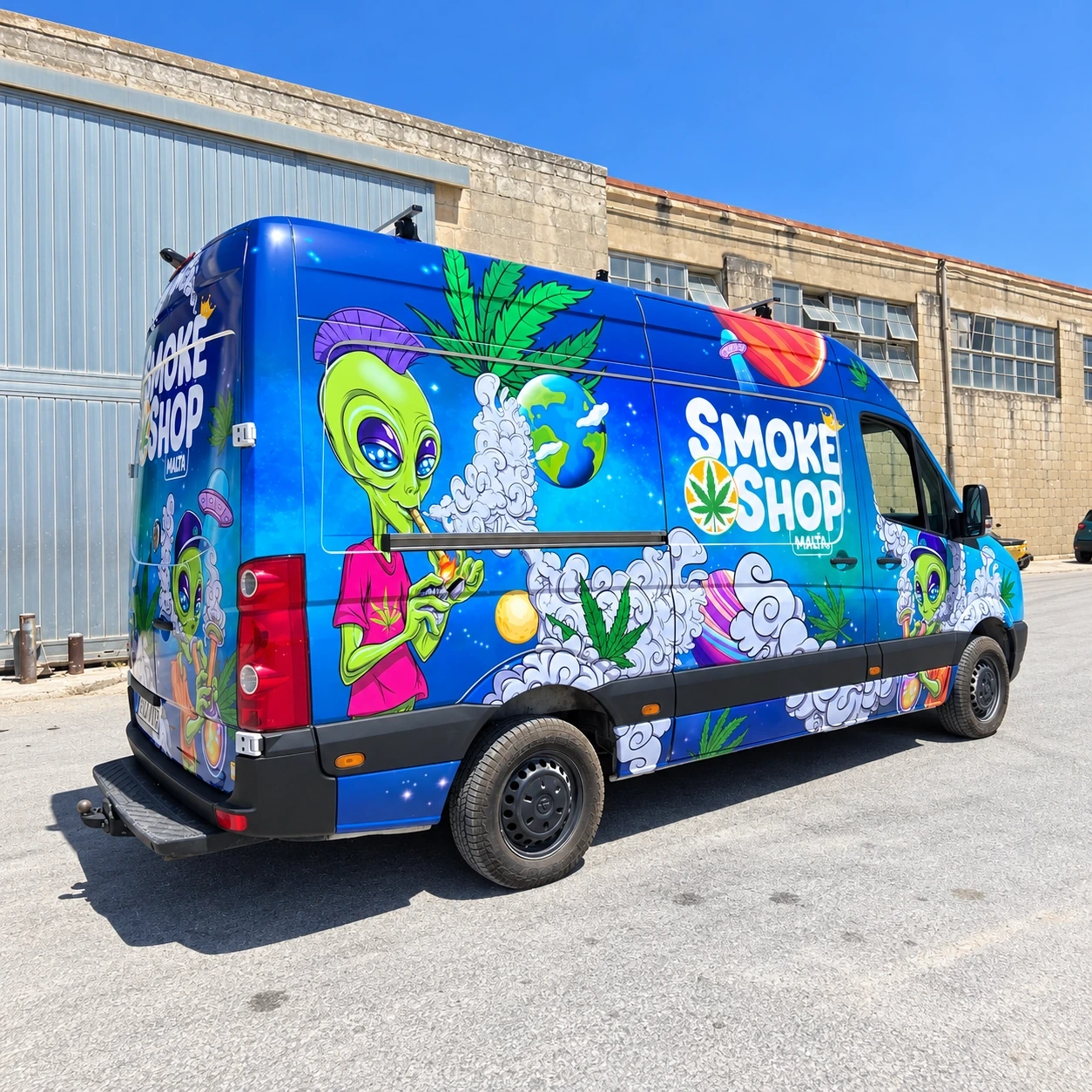 High-roof van wrapped in an illustrated blue design with cartoon characters and foliage