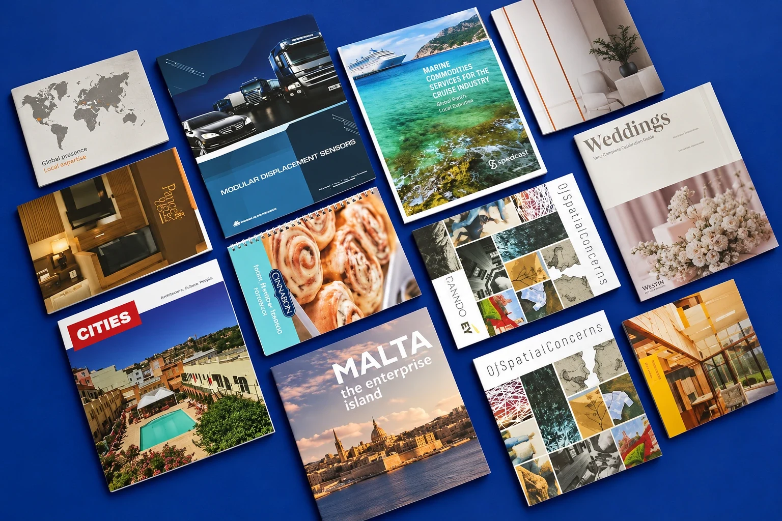 Spread of printed brochures and magazines with travel and food photography
