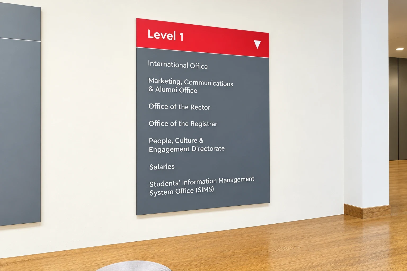 Grey wall directory panel with a red header reading Level 1 above a list of offices