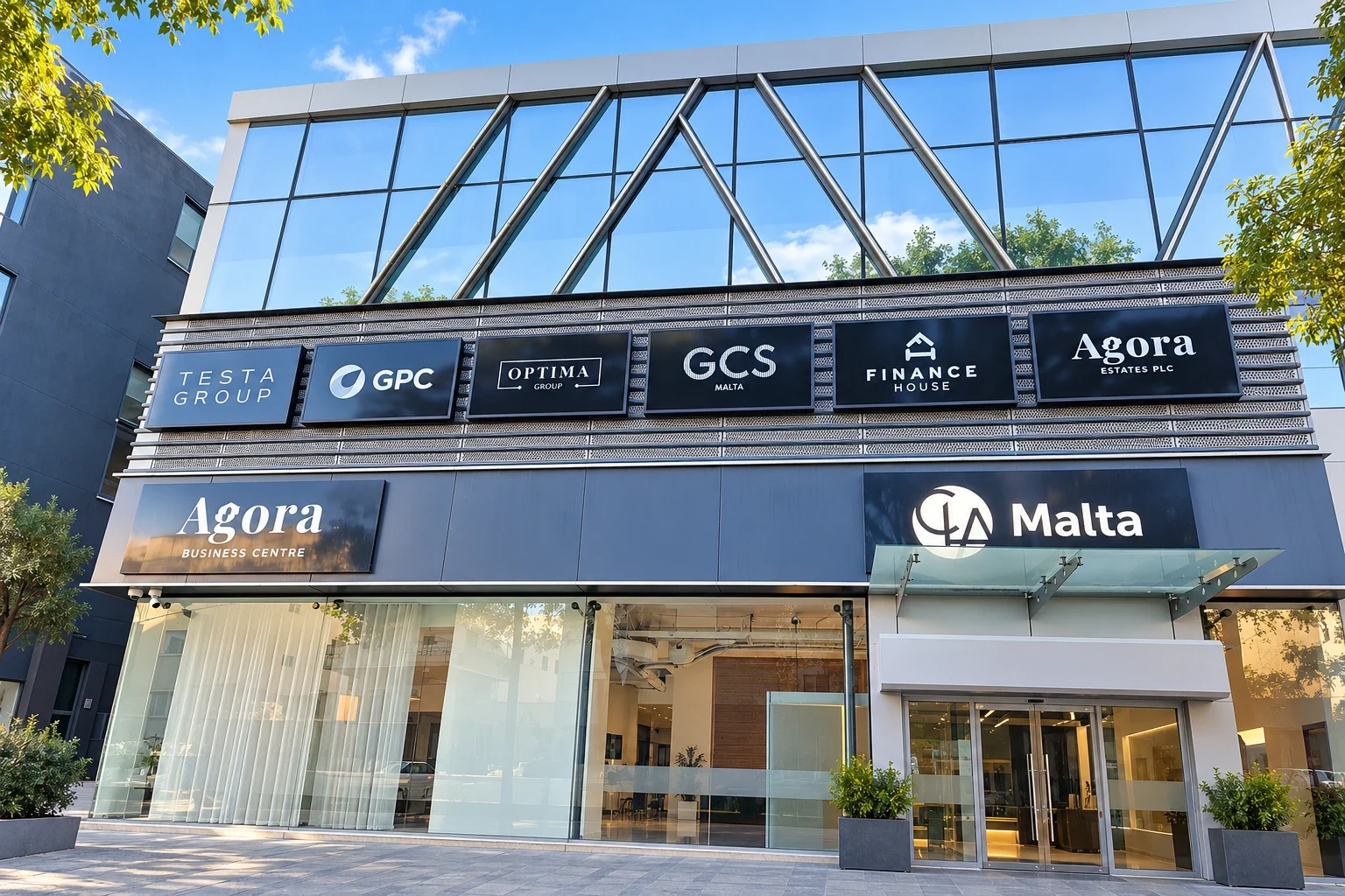 Row of six dark tenant name panels above two larger illuminated signs on a glazed building frontage